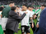 DONOSTIA, SPAIN - MAY 16: Fans of Real Racing Club de Santander celebrate with Gustavo Puerta on the pitch after securing promotion following victory in the LaLiga Hypermotion match between Real Racing Club de Santander and Real Valladolid CF at Campos de Sport de El Sardinero on May 16, 2026 in Donostia, Spain. (Photo by Juan Manuel Serrano Arce/Getty Images)