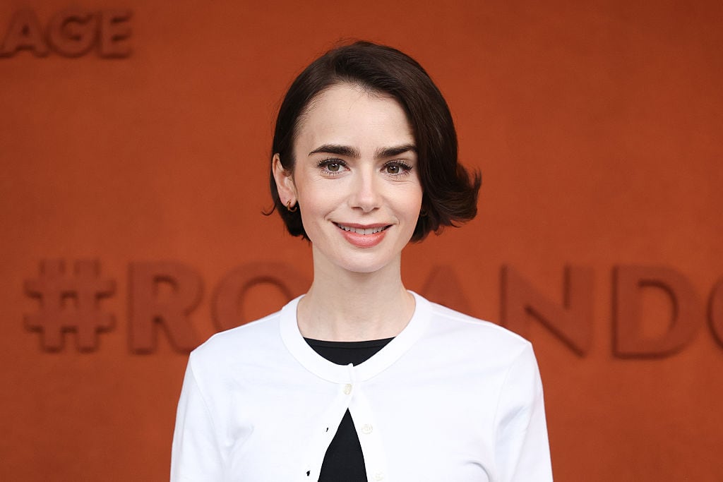 PARIS, FRANCE - JUNE 01: Lily Collins attends Day Nine of the 2026 French Open on June 01, 2026 in Paris, France. (Photo by Stephane Cardinale - Corbis/Corbis via Getty Images)