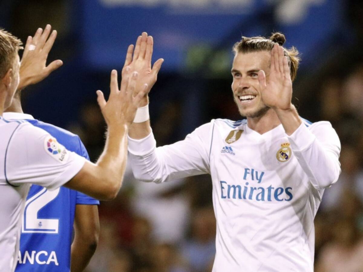 Real Madrid defiende título con goleada y liderato ante Dépor