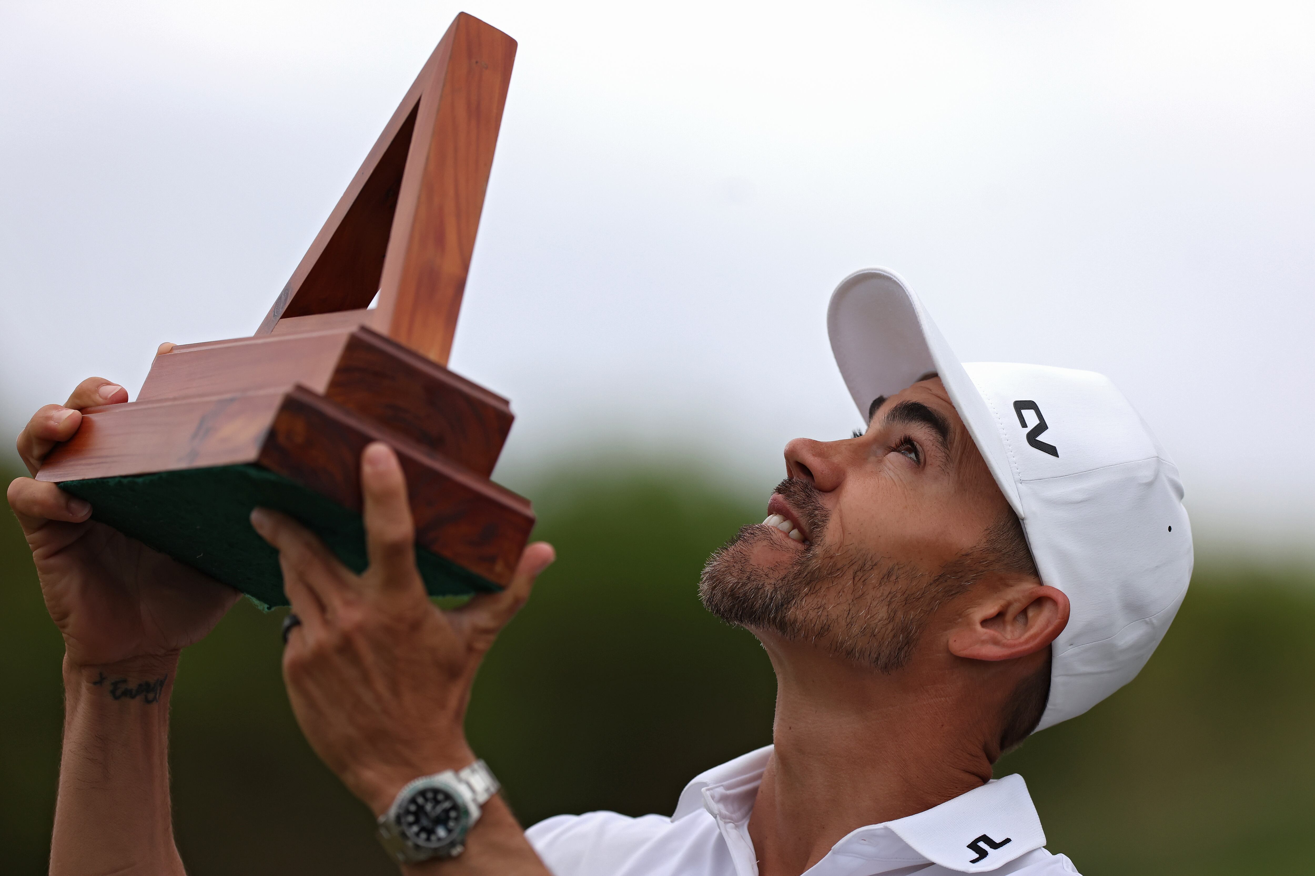 SOUTHAMPTON, BERMUDA - NOVEMBER 12: Camilo Villegas of Colombia celebrates looks skyward with the trophy after winning the Butterfield Bermuda Championship at Port Royal Golf Course on November 12, 2023 in Southampton, Bermuda. (Photo by Marianna Massey/Getty Images)