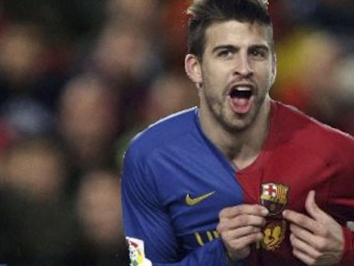 Los españoles Piqué y Busquets en duda para el partido frente al Real Madrid