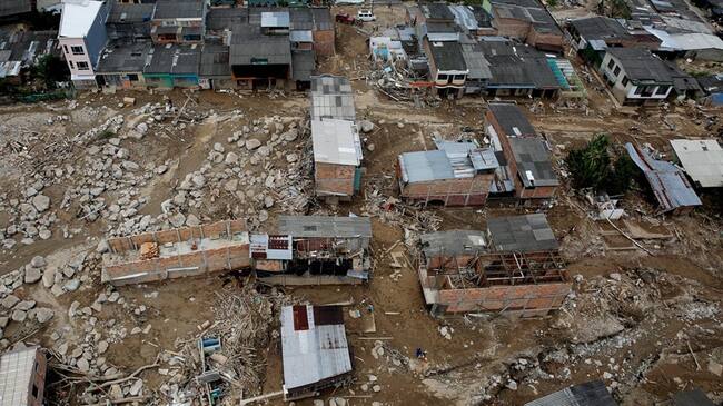 Vista aérea de un barrio afectado en Mocoa. Foto: Agencia EFE/LEONARDO MUÑOZ