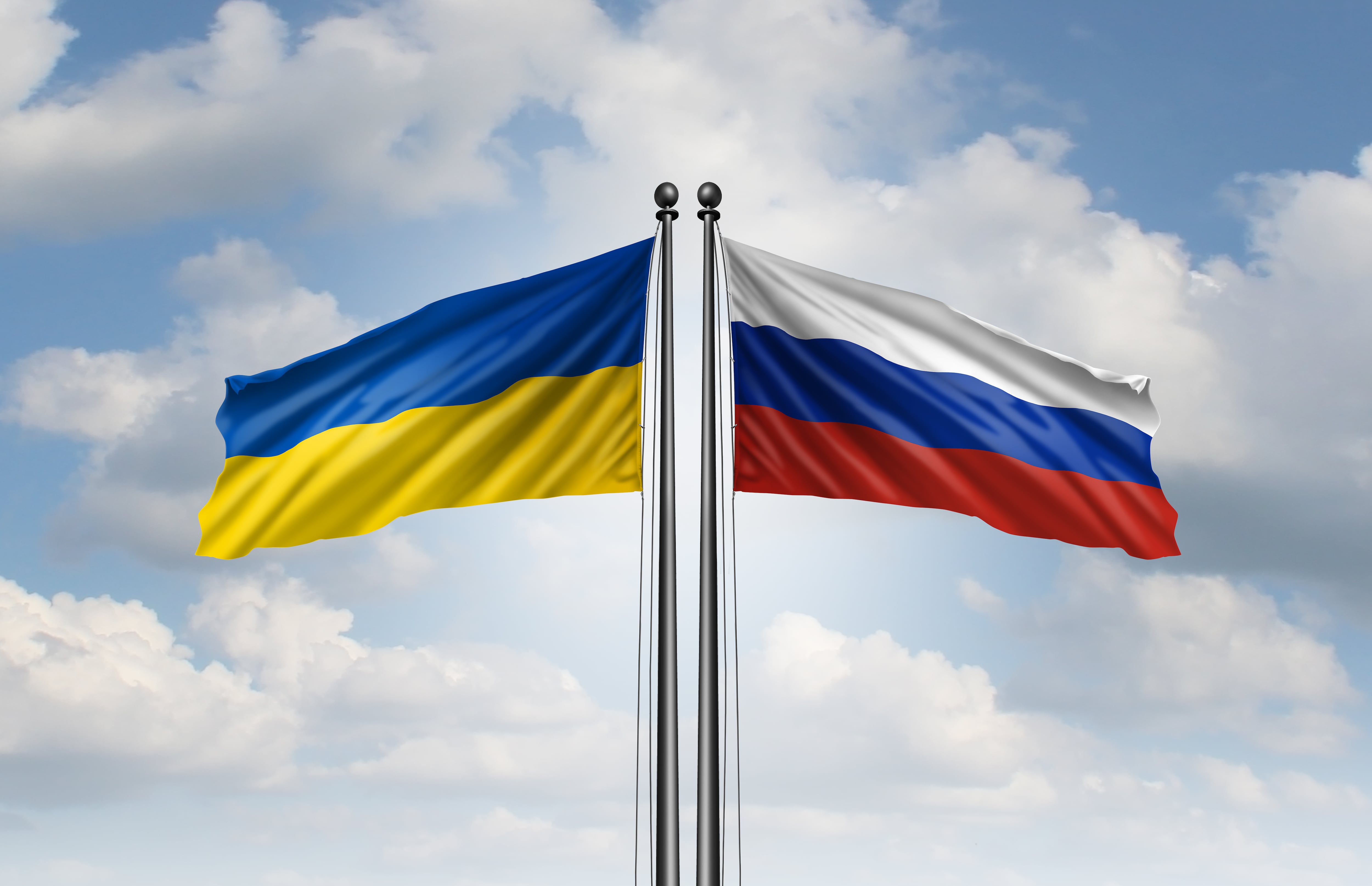 Ukrainian And Russian peace talks as flag symbols as a negotiations concept to negotiate an agreement and ceasefire or cease fire betweem Moscow and Kyiv to end the war.