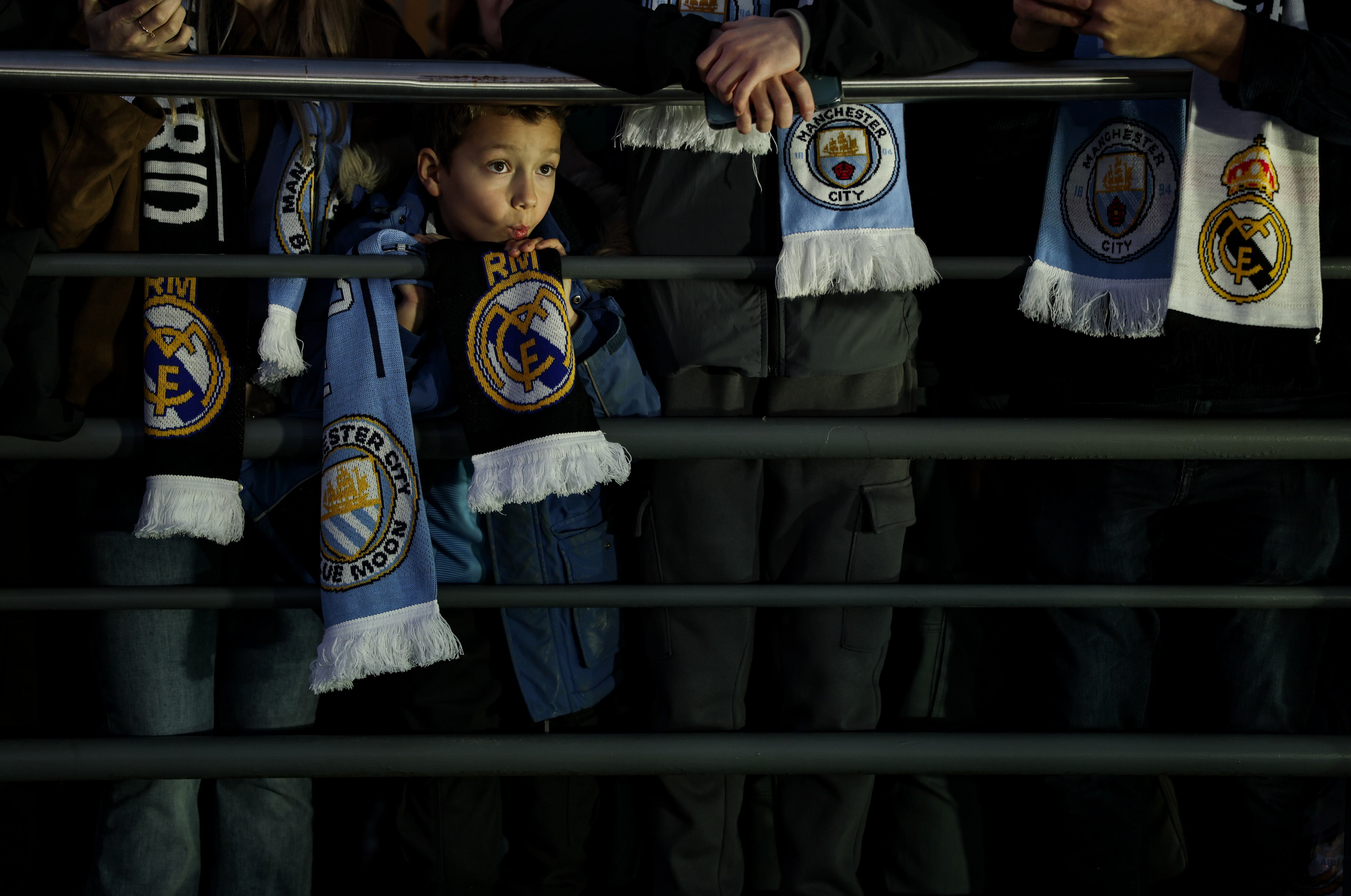MANCHESTER, ENGLAND - MARCH 17: Supporters wait for the team bus arrival prior to the UEFA Champions League 2025/26 Round of 16 Second Leg match between Manchester City FC and Real Madrid CF at City of Manchester Stadium on March 17, 2026 in Manchester, England. (Photo by Alex Pantling - UEFA/UEFA via Getty Images)