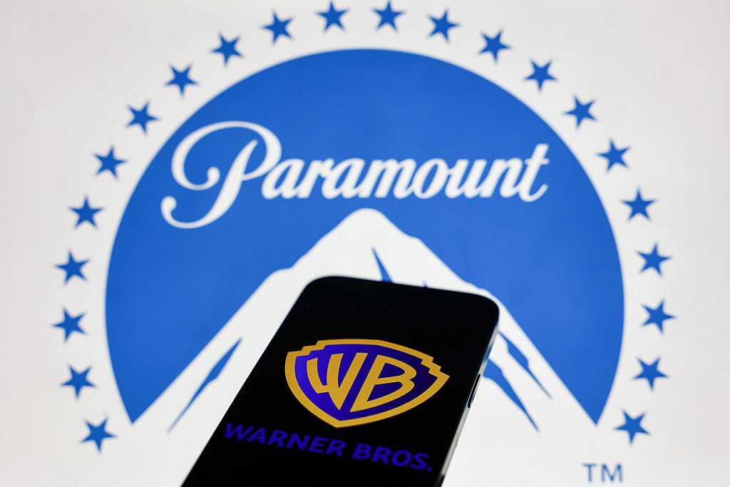 Paramount logo displayed on a laptop screen and Warner Bros logo displayed on a phone screen are seen in this illustration photo taken in Krakow, Poland on February 28, 2026. (Photo by Jakub Porzycki/NurPhoto via Getty Images)