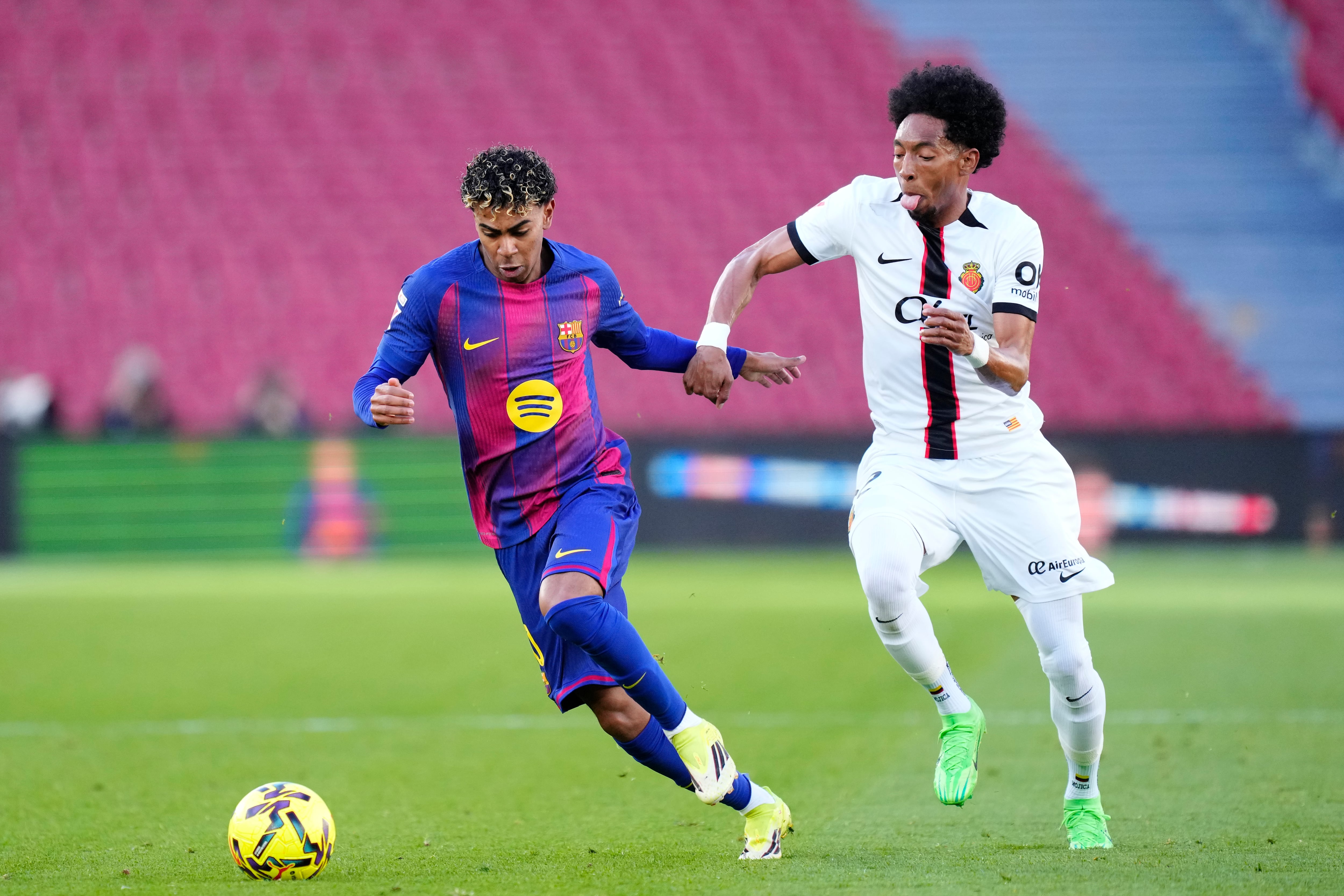 Lamine Yamal right winger of Barcelona and Spain and Johan Mojica left-back of Mallorca and Colombia compete for the ball during the La Liga EA Sports match between FC Barcelona and RCD Mallorca at Spotify Camp Nou on February 7, 2026 in Barcelona, Spain. (Photo by Jose Breton/Pics Action/NurPhoto via Getty Images)
