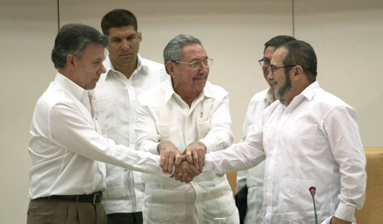 Presidente Juan Manuel Santos y jefe máximo de las Farc, Timoleón Jiménez alias "Timochenko". 