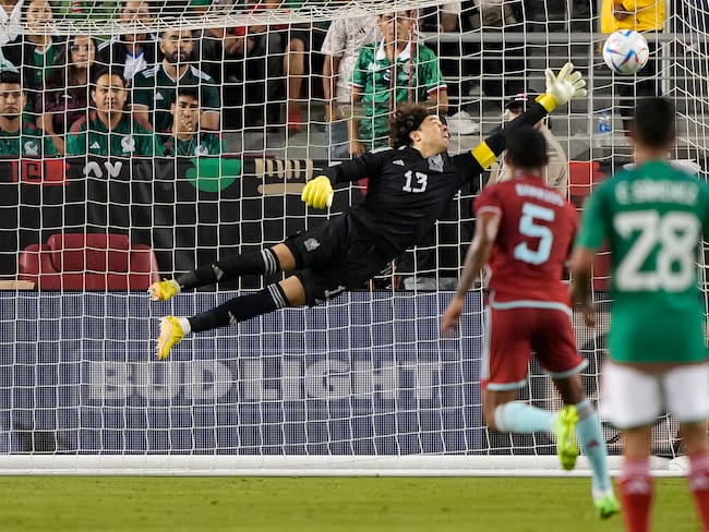 SANTA CLARA, CALIFORNIA - SEPTEMBER 27:  Wilmar Barrios #5 of Colombia scores a goal past goal keeper Guillermo Ochoa #13 of Mexico in the second half of the Mextour Send Off at Levi&#039;s Stadium on September 27, 2022 in Santa Clara, California. Colombia won the game 3-2. (Photo by Thearon W. Henderson/Getty Images)