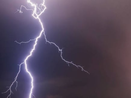 Bright lightning slams down from a Nebraska supercell storm September 15, 2006.