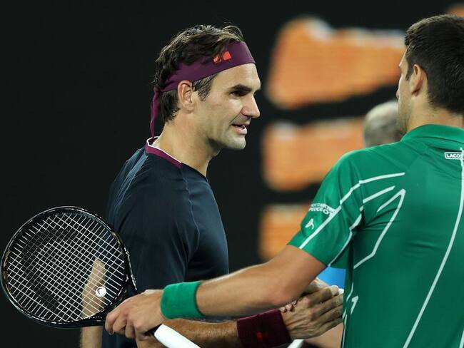 Roger Federer y Novak Djokovic tras la semifinal en el Abierto de Australia 2020.