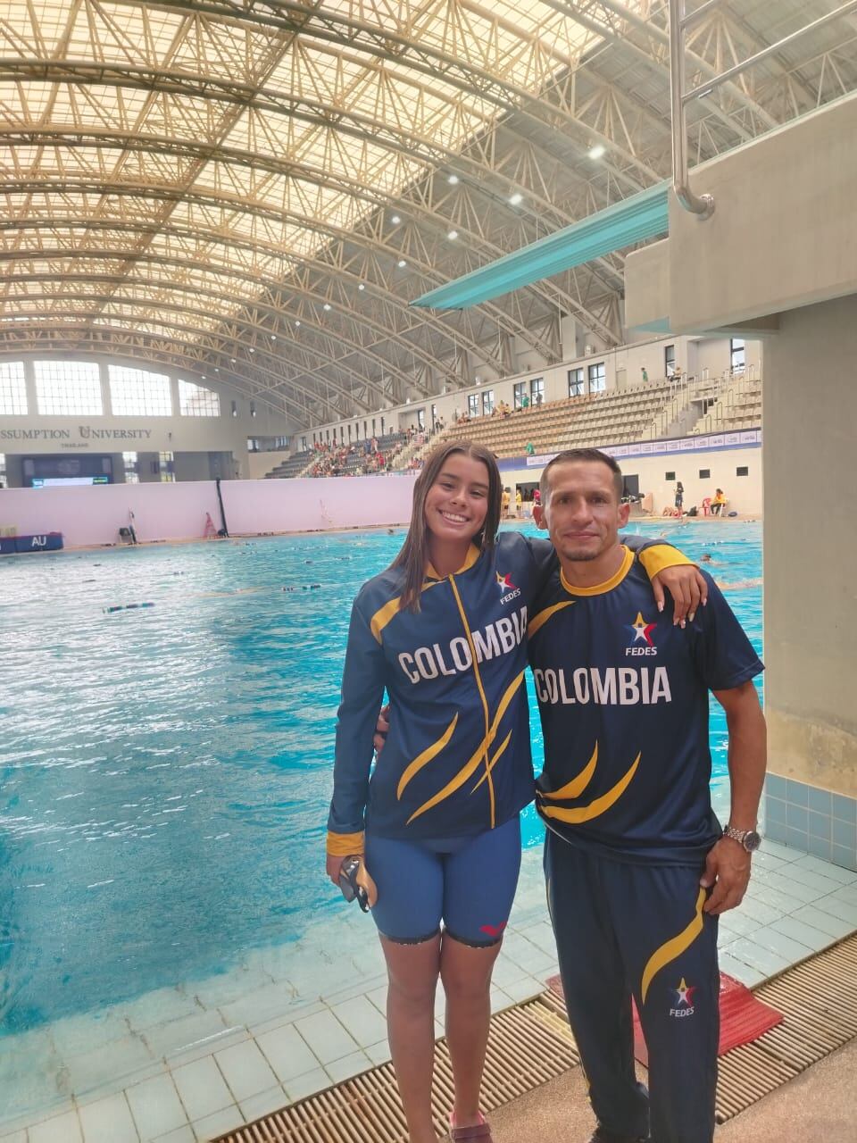 Nicoll Agudelo Jiménez y su entrenador Germán Eduardo Castillo. Foto suministrada.