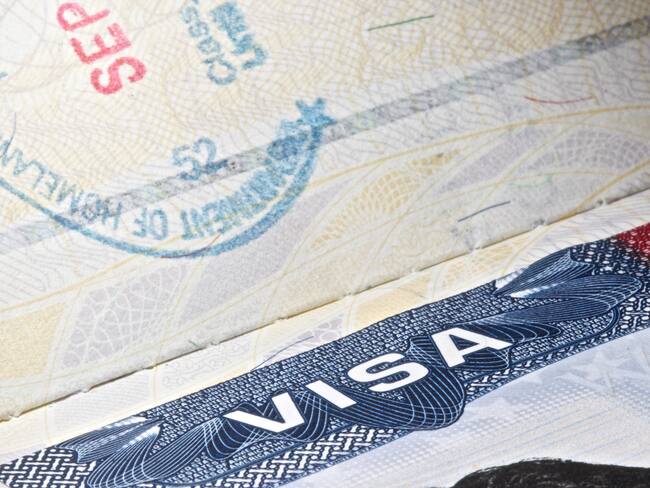 Detail of an USA VISA plus a partial stamp