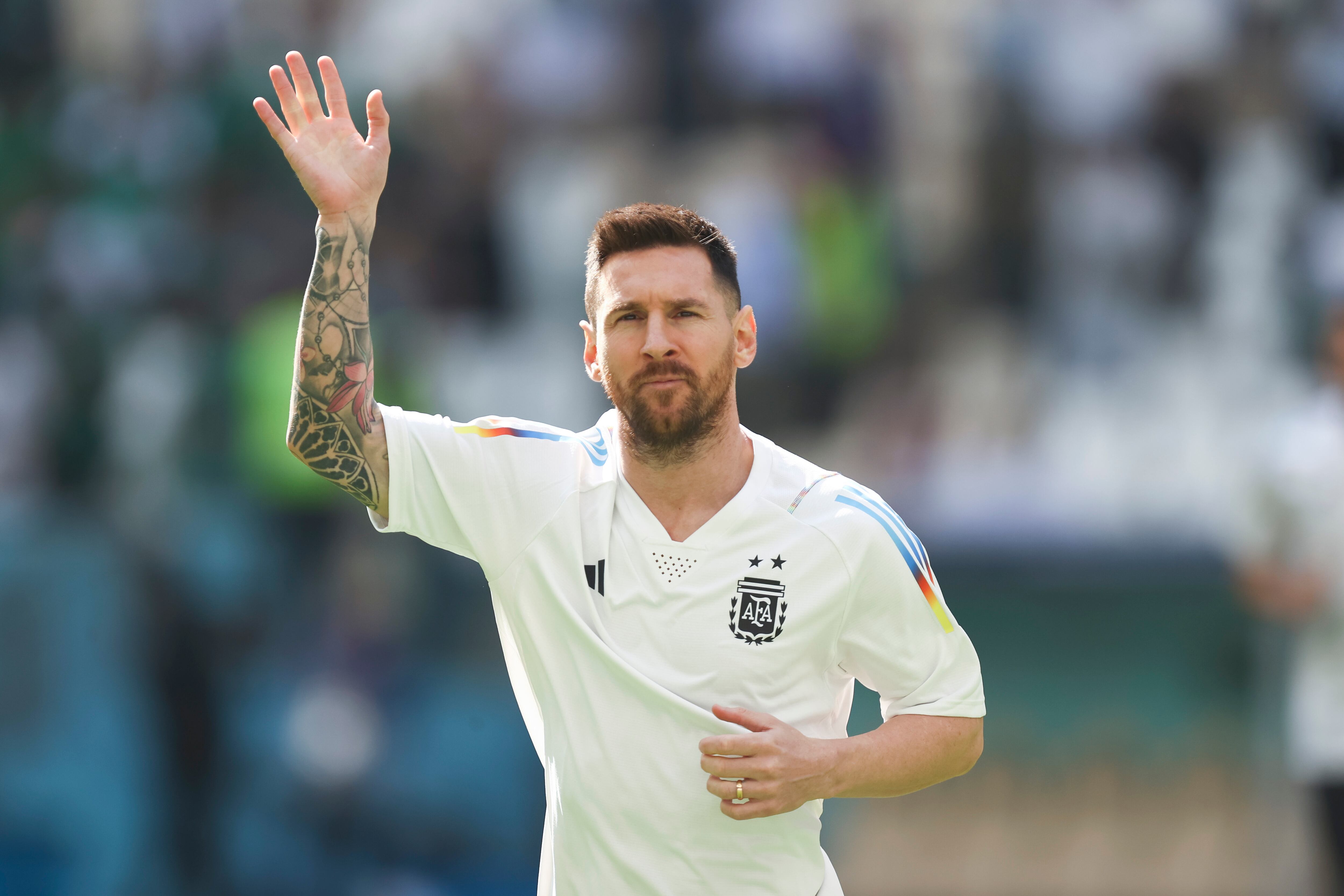 LUSAIL CITY, QATAR - NOVEMBER 22: Lionel Messi of Argentina waves before the FIFA World Cup Qatar 2022 Group C match between Argentina and Saudi Arabia at Lusail Stadium on November 22, 2022 in Lusail City, Qatar. (Photo by James Williamson - AMA/Getty Images)