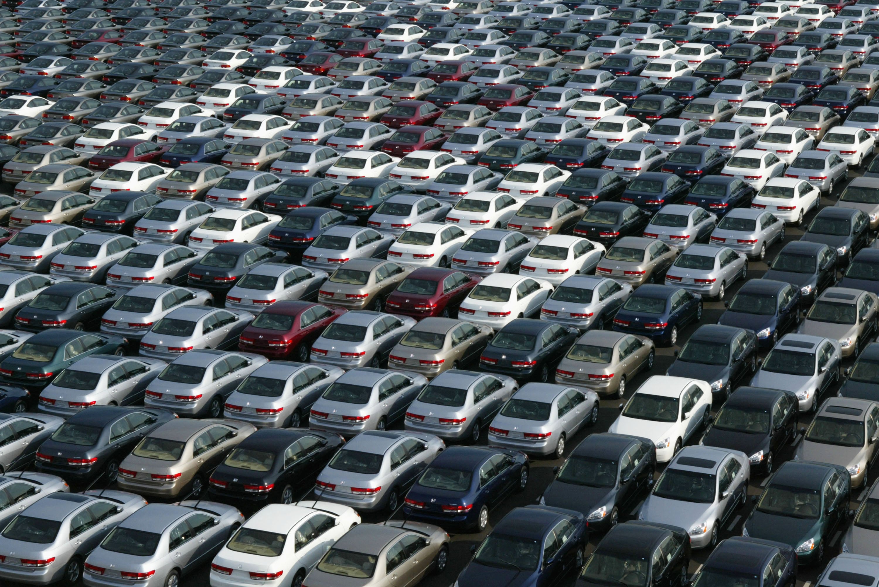 CHIBA, JAPAN - JANUARY 17: About 3,000 Honda cars wait to be exported to North America at a port January 17, 2003 in Chiba, Japan. The strength of the Japanese yen against the U.S. dollar has adversely affected the export-dependent stock of Honda.