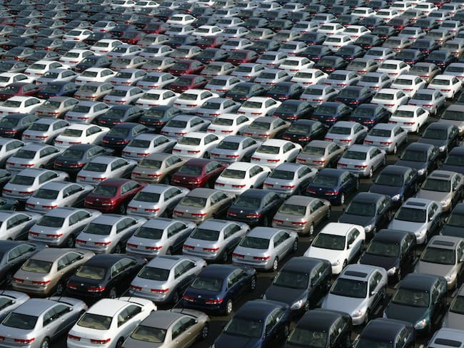 CHIBA, JAPAN - JANUARY 17: About 3,000 Honda cars wait to be exported to North America at a port January 17, 2003 in Chiba, Japan. The strength of the Japanese yen against the U.S. dollar has adversely affected the export-dependent stock of Honda.