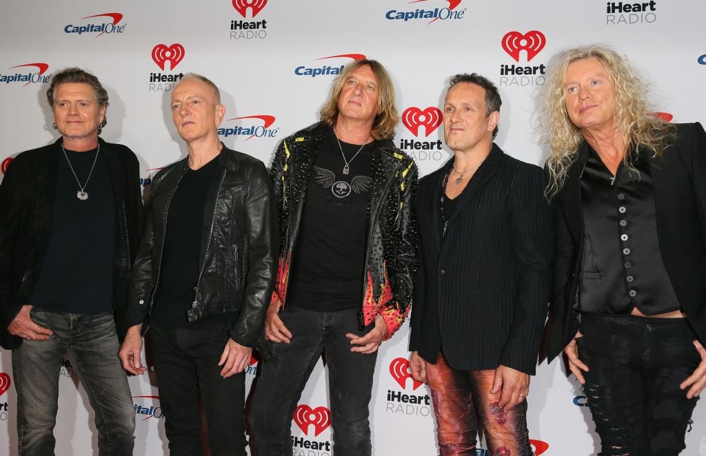 LAS VEGAS, NEVADA - SEPTEMBER 21: (L-R) Rick Allen, Phil Collen, Joe Elliott, Vivian Campbell, and Rick Savage of Def Leppard attend the 2019 iHeartRadio Music Festival at T-Mobile Arena on September 21, 2019 in Las Vegas, Nevada.  (Photo by JB Lacroix/WireImage)