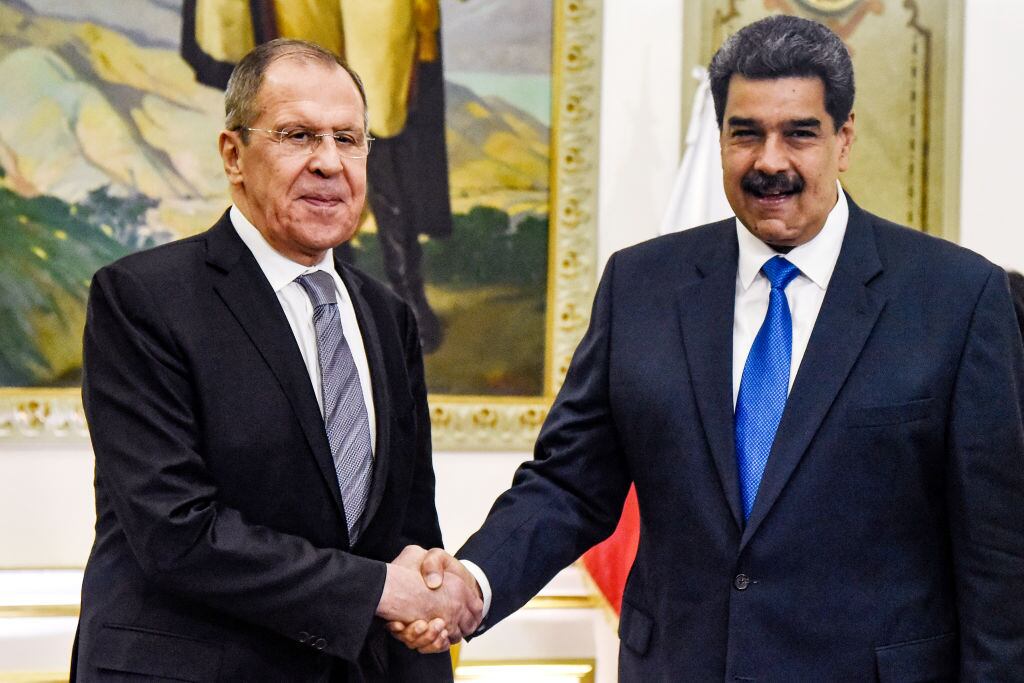 CARACAS, VENEZUELA - FEBRUARY 07: President of Venezuela Nicolas Maduro (R) shakes hands with Minister of Foreign Affairs of the Russian Federation Serguéi Lavrov (L) at Miraflores Government Palace on February 7, 2020 in Caracas, Venezuela. (Photo by Carolina Cabral/Getty Images)