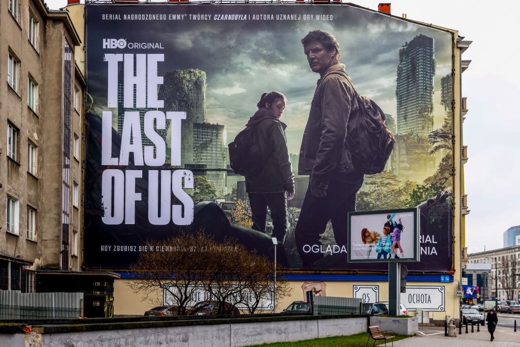 HBO's 'The Last of Us' TV series huge advertising banner is seen in the city center in Warsaw, Poland on January 19, 2023. The show is an American post-apocalyptic drama television series created by Craig Mazin and based on the 2013 video game. (Photo by Beata Zawrzel/NurPhoto via Getty Images)