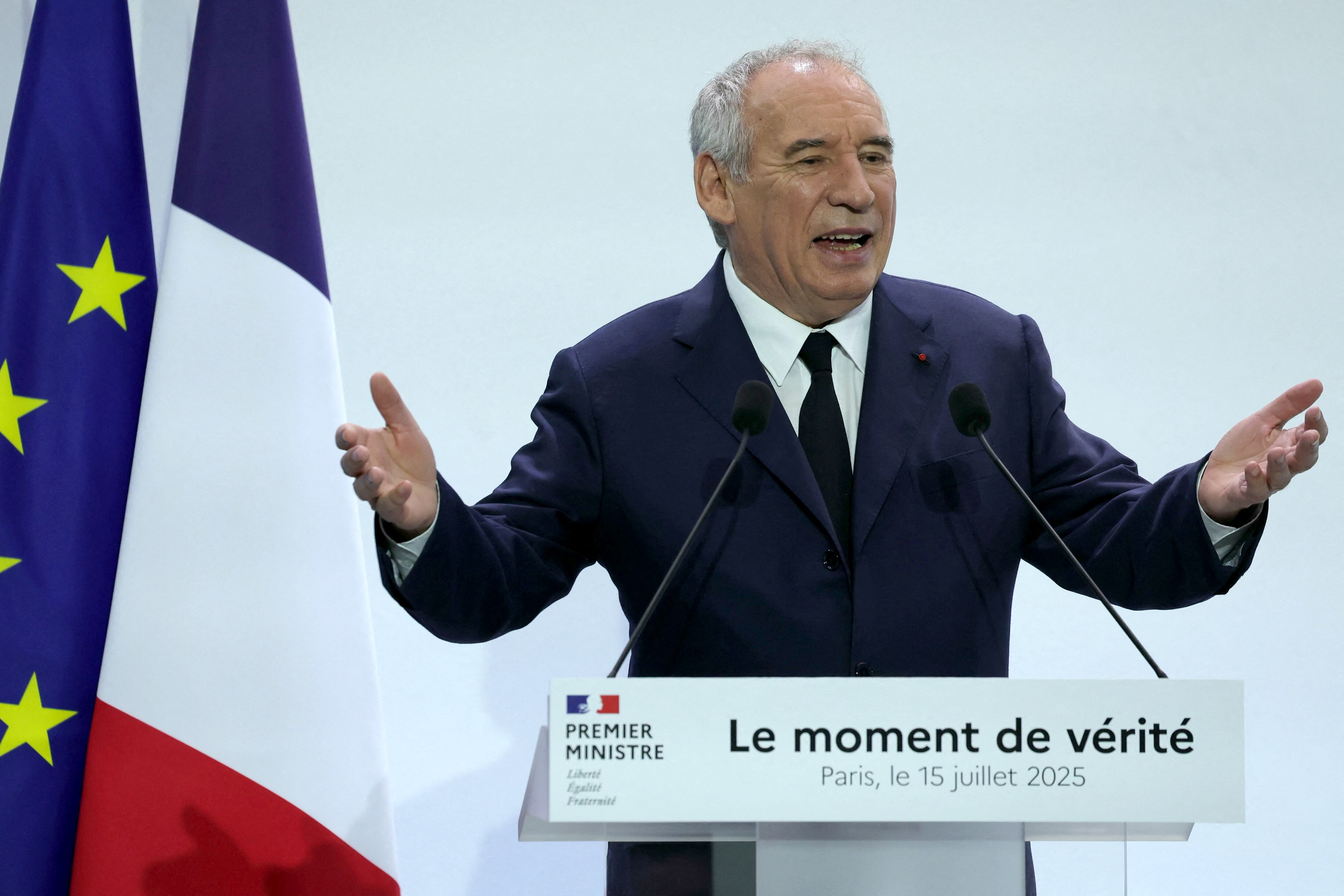 France's Prime Minister Francois Bayrou gives an address to unveil the main guidelines of France's 2026 budget, a financial and political puzzle since it foresees a significant tightening of 40 billion in savings, in addition to increasing the military budget, in Paris on July 15, 2025. The aim is to reduce the deficit to 4.6% of GDP next year, down from 5.8% in 2024, in an international context that is volatile and uncertain, amid trade tensions. (Photo by Thomas SAMSON / AFP)