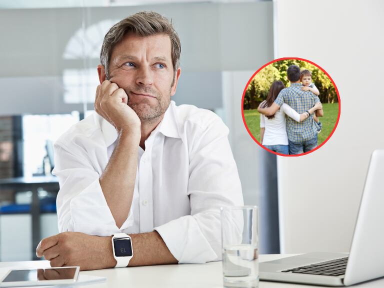 Hombre pensativo en un trabajo y de fondo una familia en el parque (Fotos vía Getty Images)