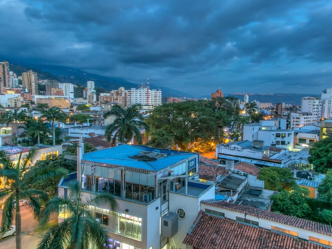 As the blue hour advances, Bucaramanga&#039;s vibrant night life emerges.  The city is nestled in the Andes and the seemingly ever-present clouds produce an indigo backdrop.