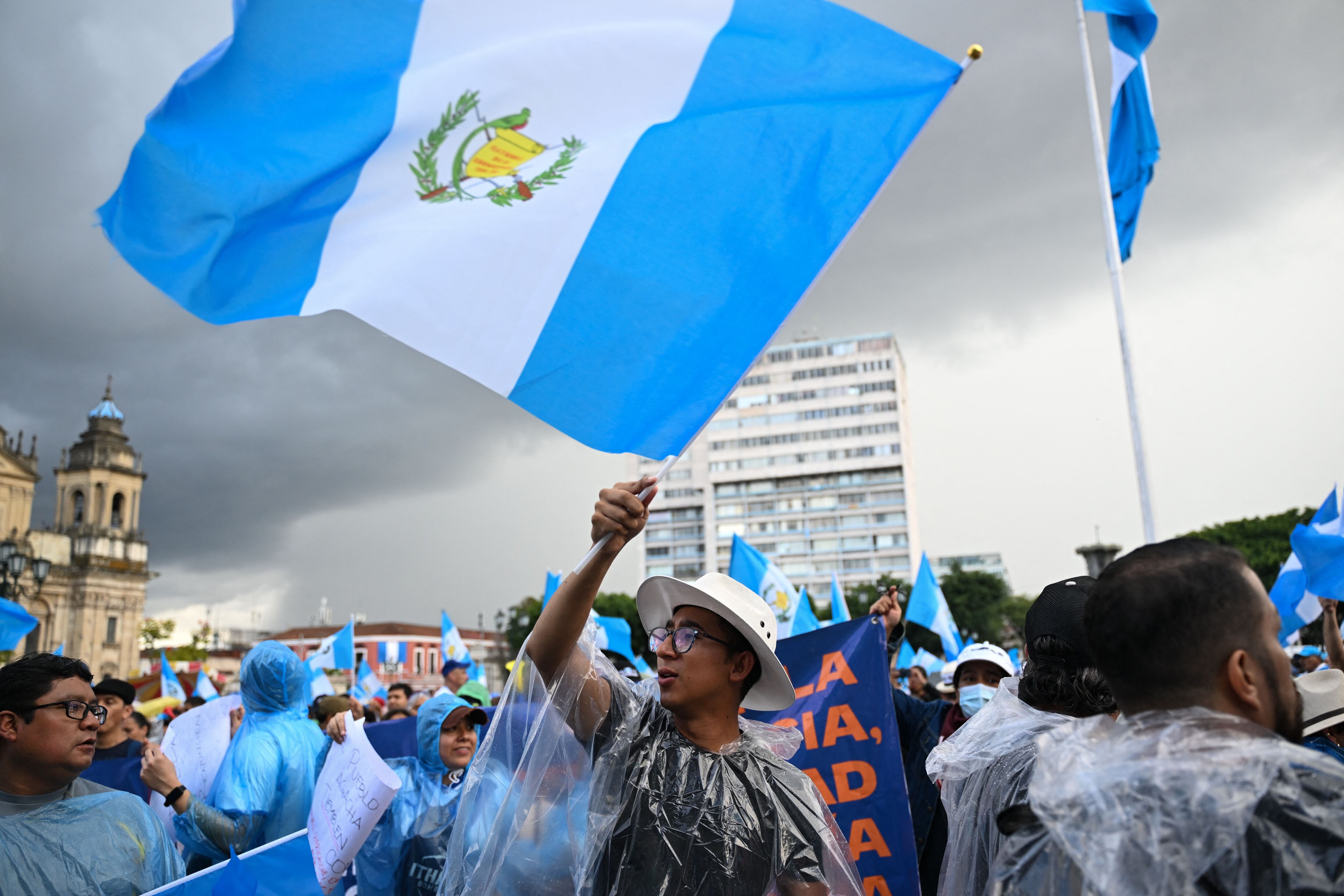 People take part in a demonstration to demand the resignation of Attorney General Consuelo Porras and prosecutor Rafael Curruchiche, accused of generating an electoral crisis to affect Guatemalan President-elect Bernardo Arevalo and the Semilla party, in Guatemala City on September 2, 2023. The elected president of Guatemala, the social democrat Bernardo Arevalo, denounced on Friday the existence of a "coup d'etat" plan to prevent him from assuming power in January 2024 after winning the August 20 runoff. (Photo by Johan ORDONEZ / AFP) (Photo by JOHAN ORDONEZ/AFP via Getty Images)