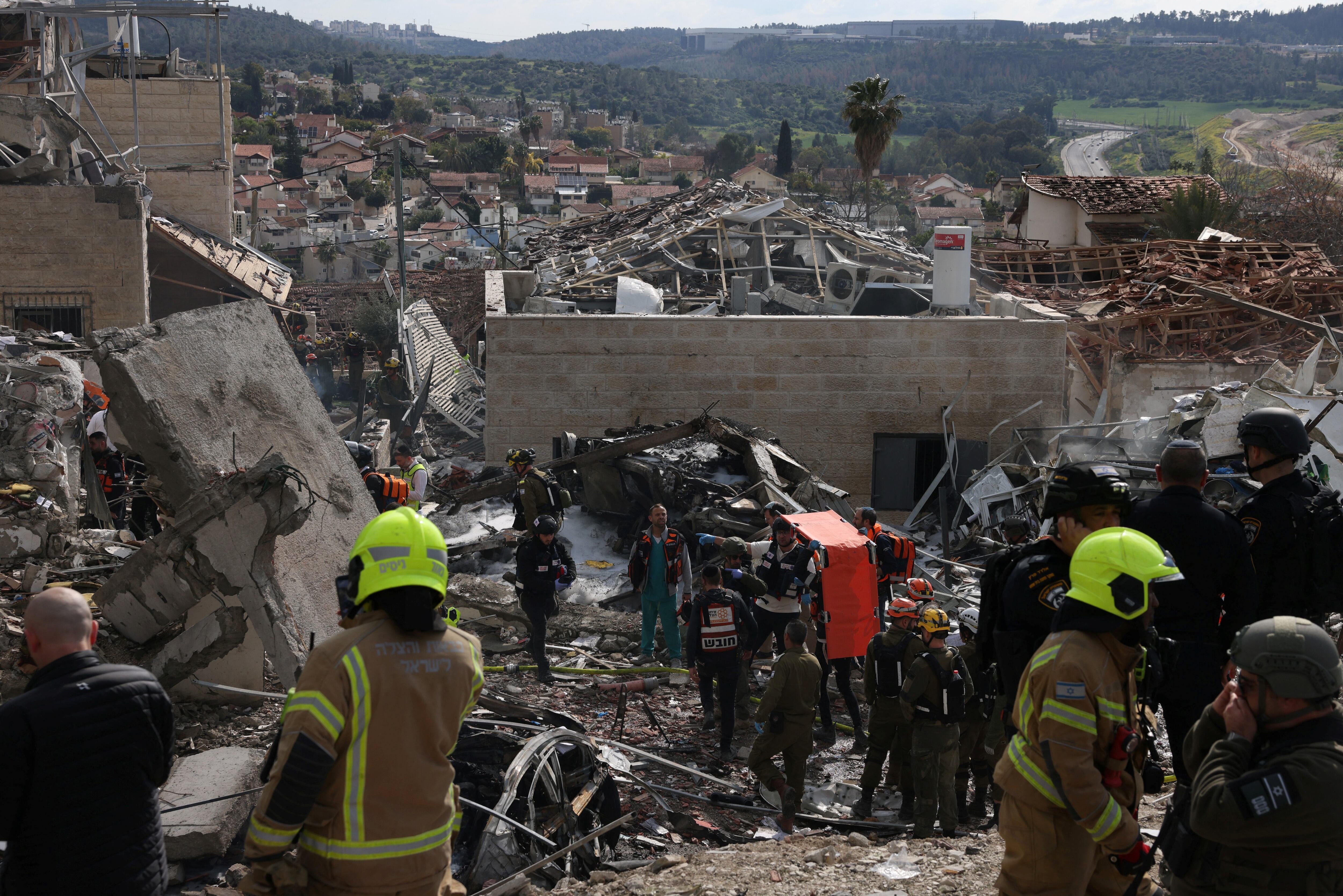 Israeli emergency services secure the scene of a missile attack near Bet Shemesh, some 30 kilometres west of Jerusalem on March 1, 2026. Israeli emergency services announced that several people were injured on March 1, in the Bet Shemesh area (centre) after further Iranian missile strikes, the day after the US and Israel attacked Iran and assassinated its supreme leader. (Photo by AHMAD GHARABLI / AFP)