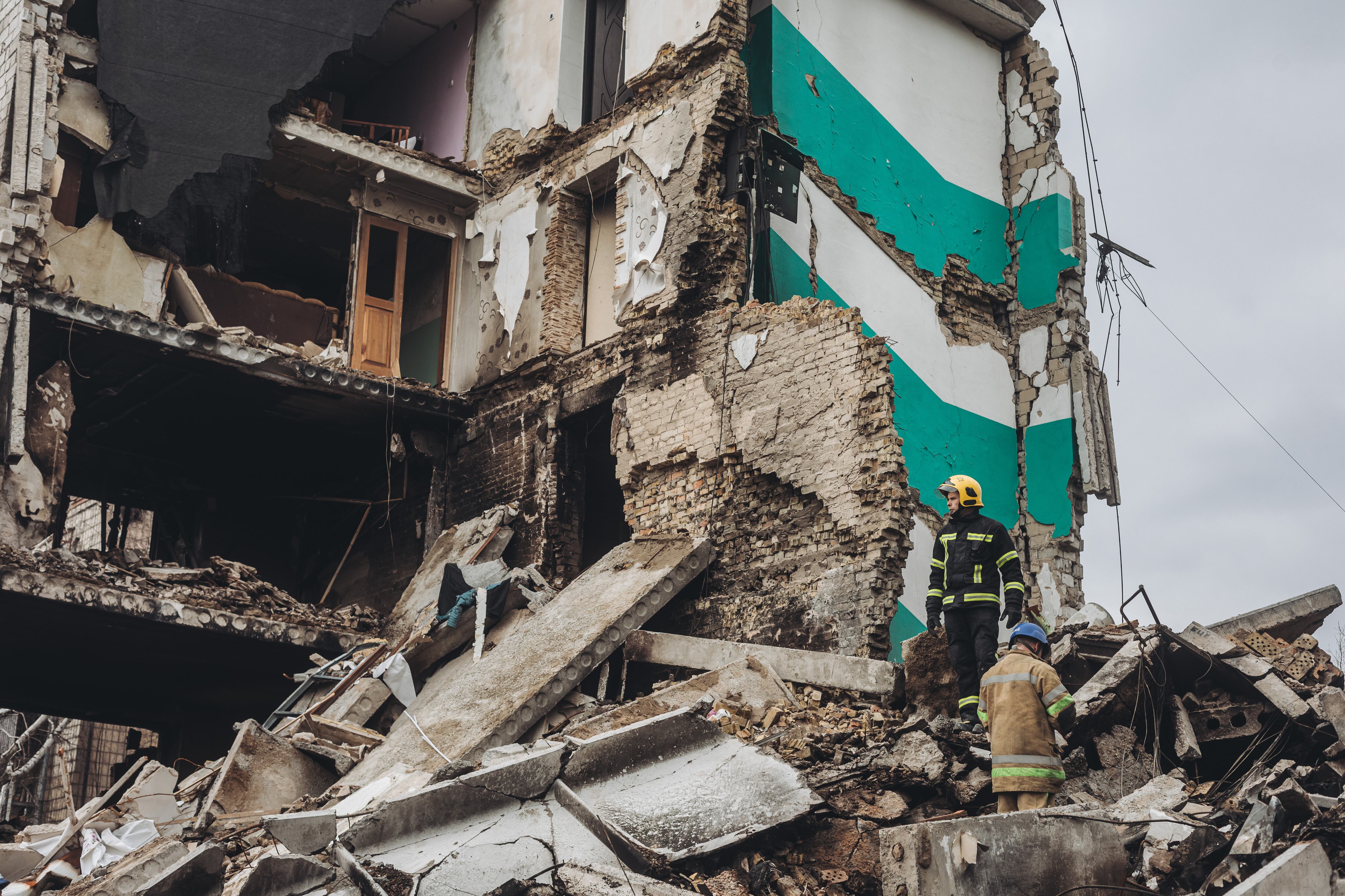 Borodyanka, UKRAINE - APRIL 6: Firefighters remove debris from a building bombed by the Russian army in Borodyanka, Ukraine, 6 April 2022. (Photo by Diego Herrera Carcedo/Anadolu Agency via Getty Images)