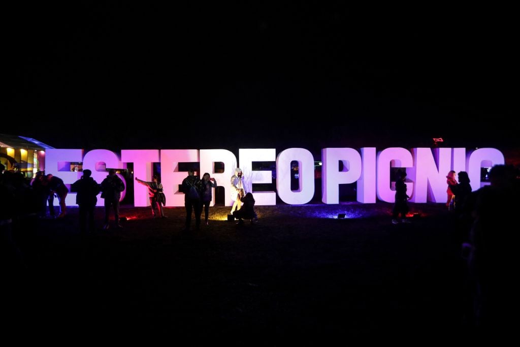 Music fans pose for picture at the Estereo Picnic festival in Bogotá on March 25, 2023. (Photo by Juan Pablo Pino / AFP) (Photo by JUAN PABLO PINO/AFP via Getty Images)