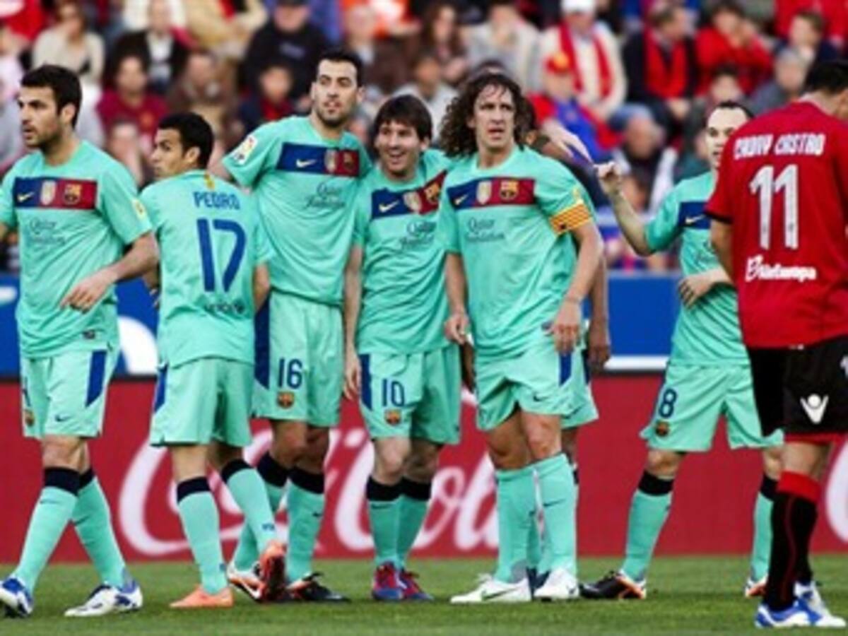 El Barça gana con diez en Mallorca y sigue presionando al Real Madrid