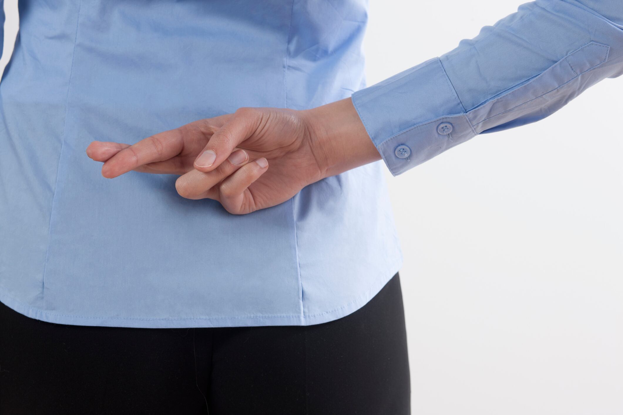 Imagen de referencia de dedos cruzados.