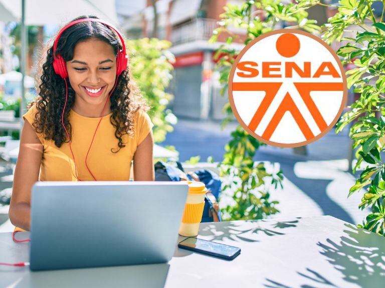 Imagen de referencia // Una mujer estudiando // En el círculo logo SENA // Getty Images //