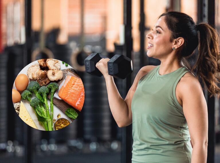Mujer haciendo pesas para aumentar su masa muscular / Alimentos ricos en nutrientes (Getty Images)