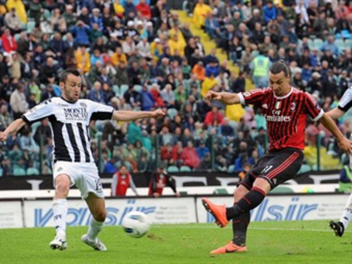 Juventus y Milan ganan y dejan abierta la lucha por el título