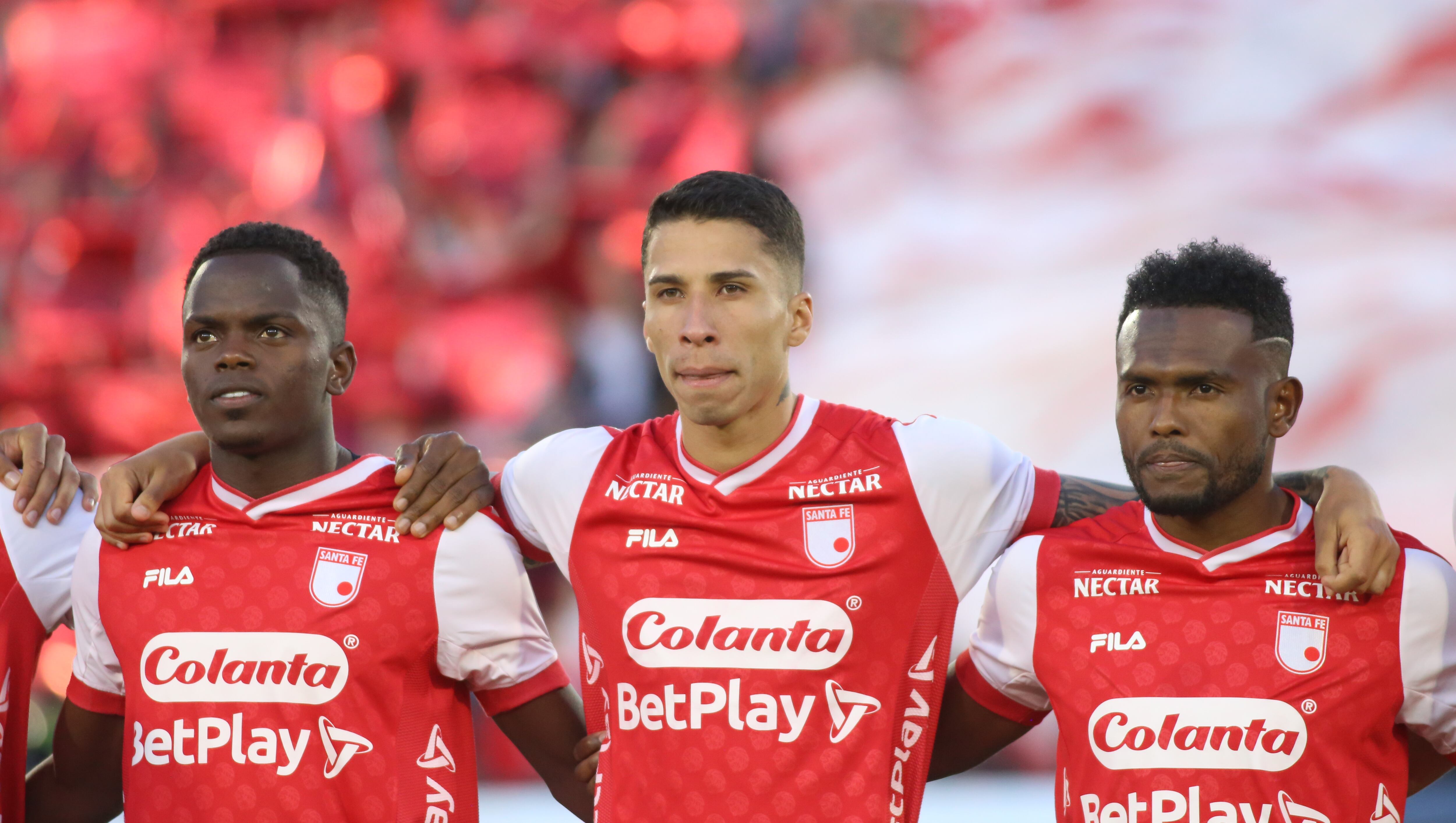 Jhojan Torres (L), Agustin Rodriguez, and Elvis Perlaza of Independiente Santa Fe are playing during the match on matchday 5 of the quadrangular semifinals group B between Independiente Santa Fe and La Equidad for the Liga BetPlay DIMAYOR I 2024 at the Nemesio Camacho El Campin stadium in Bogota, Colombia. (Photo by Daniel Garzon Herazo/NurPhoto via Getty Images)