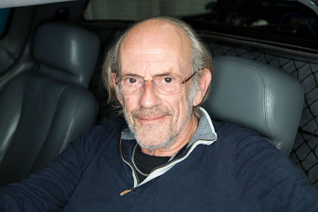 VANCOUVER, BC - NOVEMBER 11, 2016: Actor Christopher Lloyd sits in a DeLorean DMC-12 for "Back the Future Day" at Fan Expo Vancouver 2016 at the Vancouver Convention Centre on November 11, 2016 in Vancouver, Canada. (Photo by Phillip Chin/WireImage)