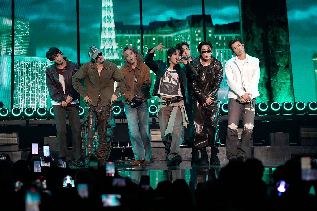 LAS VEGAS, NEVADA - SEPTEMBER 18: (L-R) (L-R) Jin, Jung Kook, Suga, Jimin, j-hope, V,  and RM of BTS perform onstage during the 2026 iHeartRadio Music Festival at T-Mobile Arena on September 18, 2026 in Las Vegas, Nevada. (Photo by Jeff Kravitz/FilmMagic)