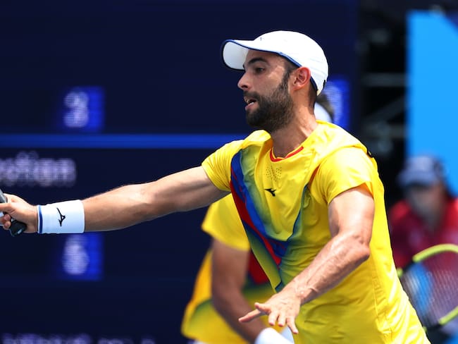 Tokyo 2020 Olympics - Tennis - Men's Doubles - Quarterfinal - Ariake Tennis Park - Tokyo, Japan - July 28, 2021. Juan Sebastian Cabal of Colombia and Robert Farah of Colombia in action during their quarterfinal match against Marcus Daniell of New Zealand and Michael Venus of New Zealand REUTERS/Lucy Nicholson