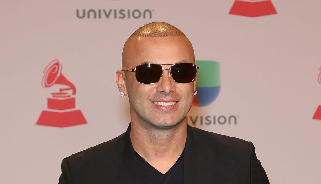 LAS VEGAS, NV - NOVEMBER 20:  Rapper Wisin arrives at the 15th annual Latin GRAMMY Awards at the MGM Grand Garden Arena on November 20, 2014 in Las Vegas, Nevada.  (Photo by Gabe Ginsberg/FilmMagic)