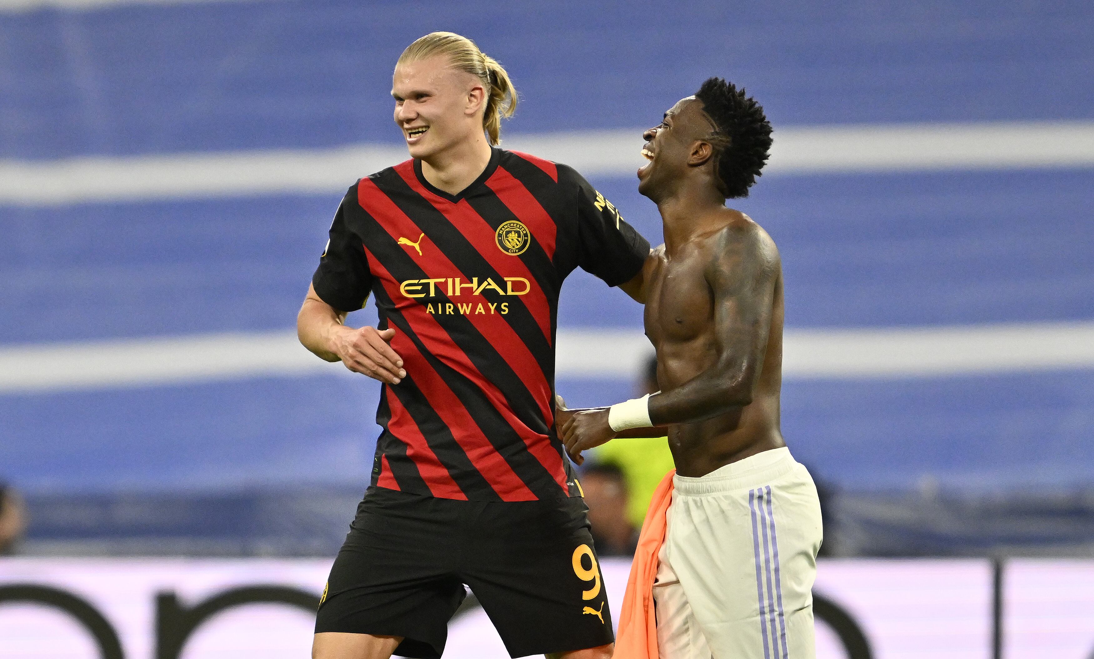 MADRID, SPAIN - MAY 09: Vinicius Junior (R) of Real Madrid and Erling Haaland (L) of Manchester City greet each other after the UEFA Champions League semi-final match between Real Madrid and Manchester City at Santiago Bernabeu Stadium in Madrid, Spain on May 09, 2023. (Photo by Burak Akbulut/Anadolu Agency via Getty Images)