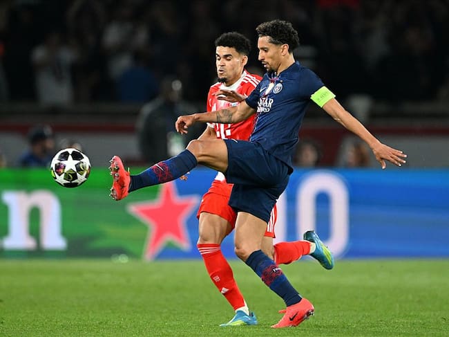 28 April 2026, France, Paris: Soccer, Men: Champions League, Paris Saint-Germain - Bayern Munich, semi-final, first leg, Parc des Princes, Luis Díaz (Bayern Munich) and Marquinhos (Paris Saint-Germain) fight for the ball. Photo: Federico Gambarini/dpa (Photo by Federico Gambarini/picture alliance via Getty Images)