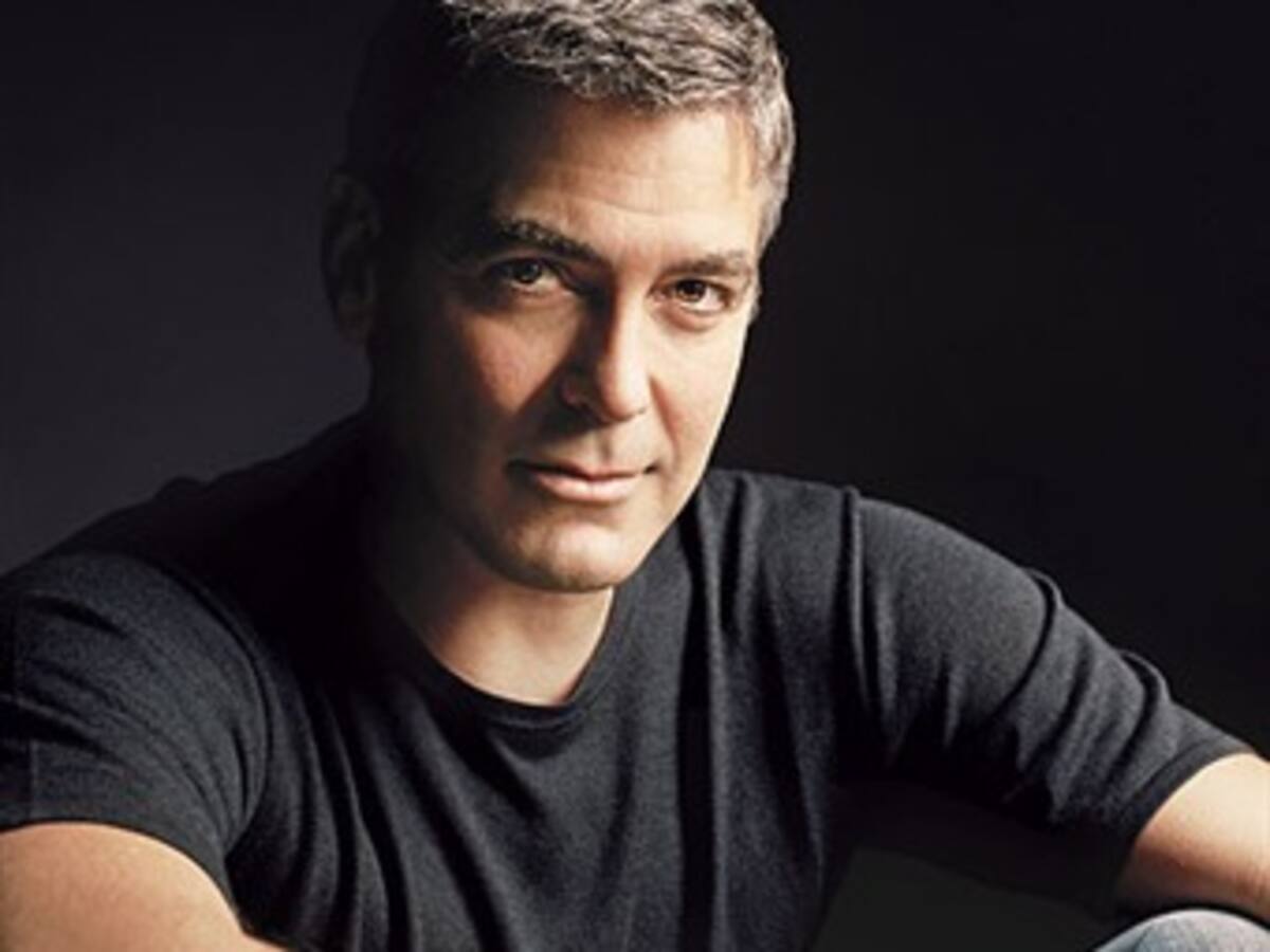 George Clooney invita a cenar a su vecino de mesa, pero este no lo reconoce