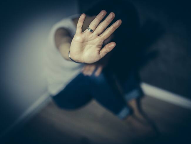 An abused woman trying to defend herself