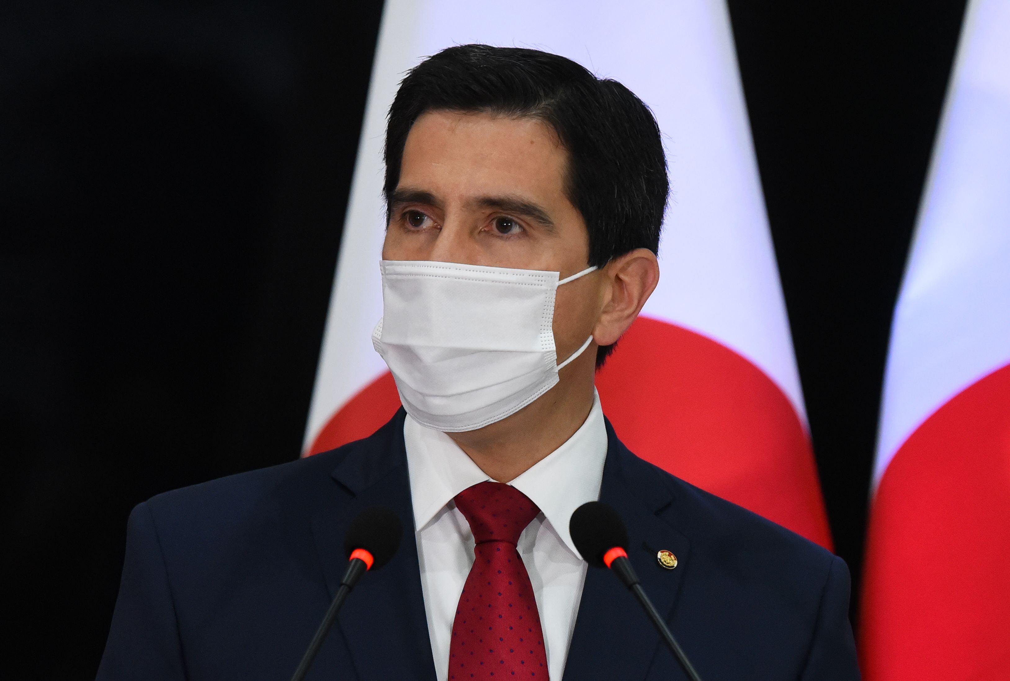 Paraguayan Foreign Minister Federico Gonzalez holds a press conference along with his Japanese counterpart Toshimitsu Motegi (out of frame) after holding a meeting at the Foreign Ministry in Asuncion on January 7, 2021. (Photo by Norberto DUARTE / AFP) (Photo by NORBERTO DUARTE/AFP via Getty Images)