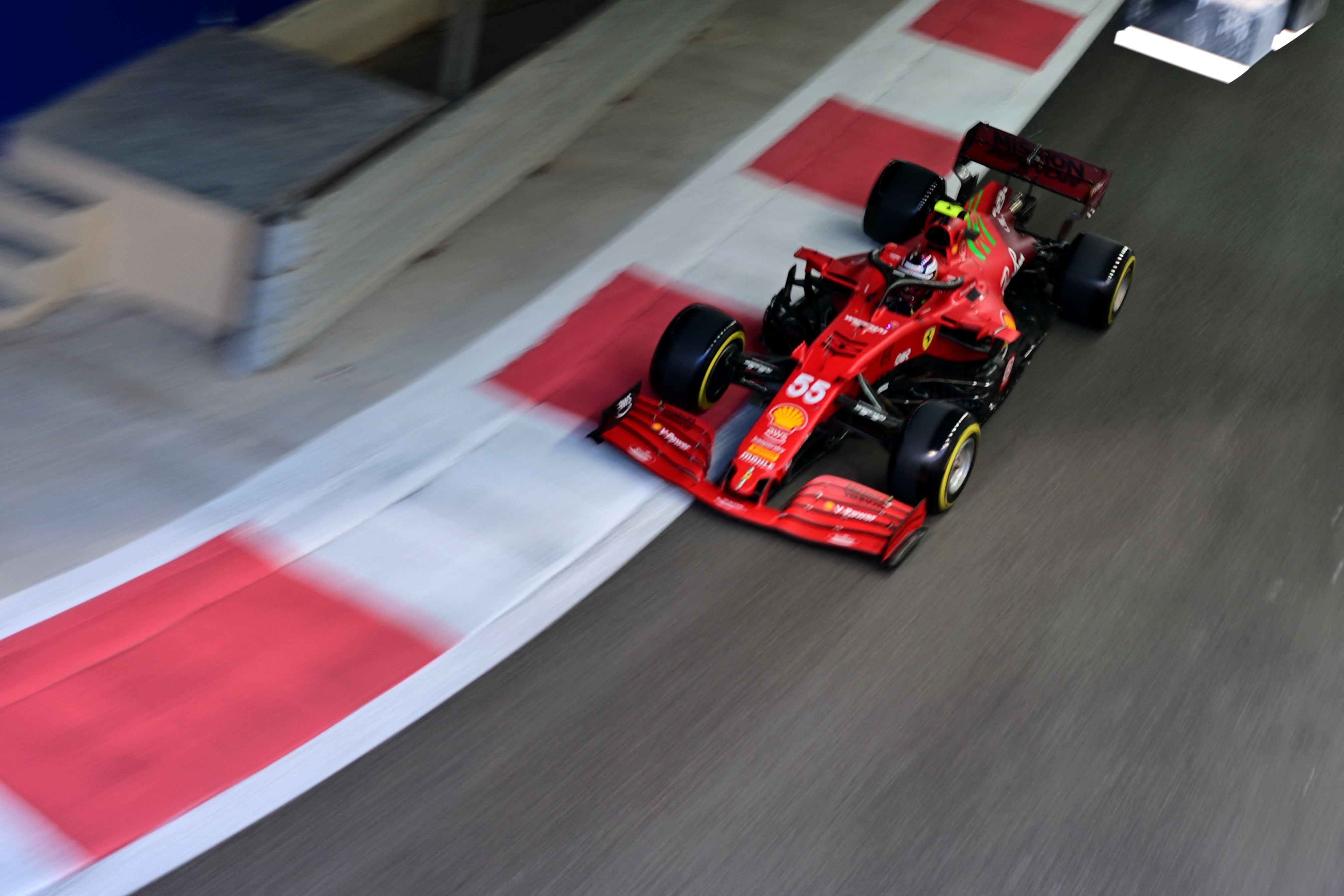 Ferrari's Spanish driver Carlos Sainz Jr drives at the Yas Marina Circuit during the qualifying session of the Abu Dhabi Formula One Grand Prix on December 11, 2021. (Photo by ANDREJ ISAKOVIC / AFP) (Photo by ANDREJ ISAKOVIC/AFP via Getty Images)