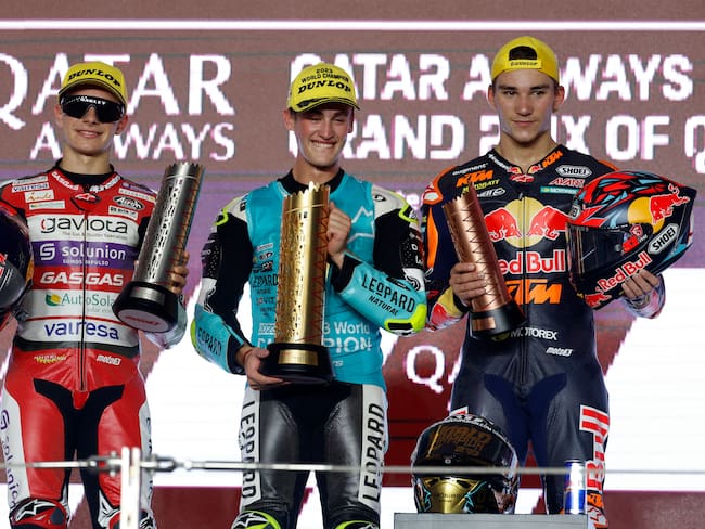 First place winner Leopard Racing&#039;s Spanish rider Jaume Masia, second-place GASGAS Aspar Team Colombian rider David Alonso and third-place Red Bull KTM Ajo Turkish rider Deniz Oncu pose on the podium after the Moto3 Grand Prix of Doha at the Losail International Circuit, in the city of Lusail on November 17, 2023. (Photo by KARIM JAAFAR / AFP) (Photo by KARIM JAAFAR/AFP via Getty Images)