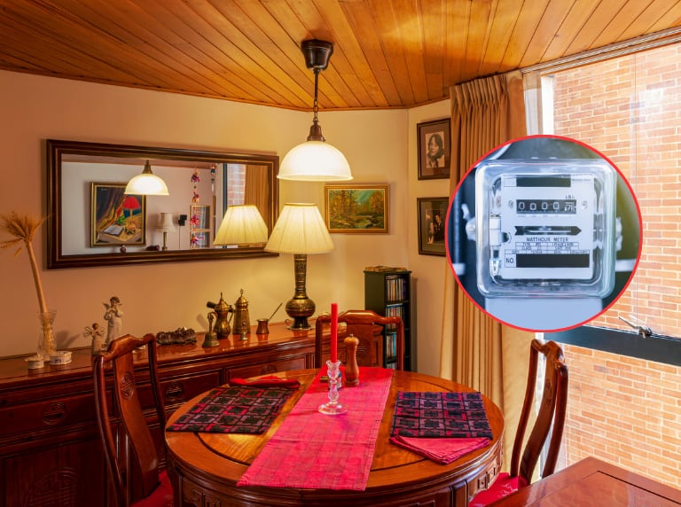 Comedor con las luces prendidas en apartamento en Bogotá / Contador de luz eléctrico (Getty Images)