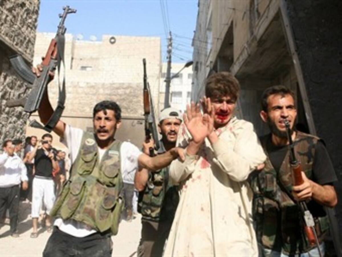 Los rebeldes sirios denuncian una masacre con 220 muertos en Homs