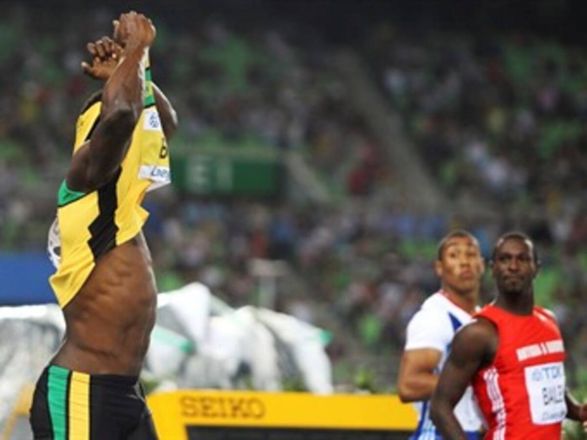 Usain Bolt, descalificado, cedió la corona de 100m a su amigo Blake