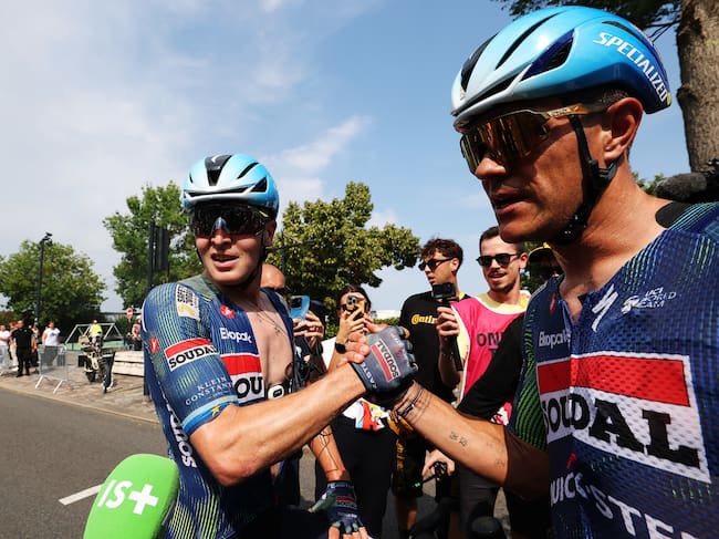 BORDEAUX, FRANCE - JULY 10: (L-R) Stage winner Tim Merlier of Belgium and Jasper Stuyven of Belgium and Team Soudal Quick-Step react after the 113th Tour de France 2026, Stage 7 a 175.1km stage from Hagetmau to Bordeaux / #UCIWT / on July 10, 2026 in Bordeaux, France. (Photo by Gonzalo Fuentes - Pool/Getty Images)